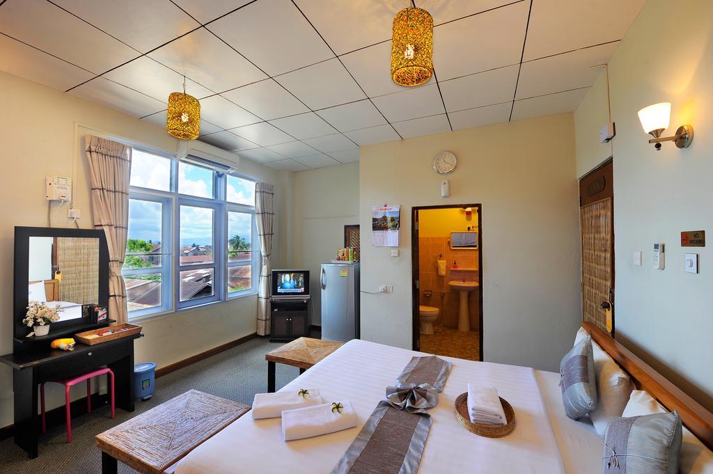 Cinderella Hotel Mawlamyine Δωμάτιο φωτογραφία